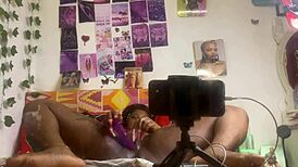 She masturbates alone with a dildo, fingering her pussy while bent over in front of the mirror.