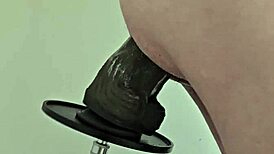 Watch that monster black dildo fuck my ass on the machine!