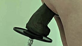 Watch that monster black dildo fuck my ass on the machine!
