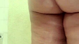 Pretty pink pussy Lil-Ryda seductively oils up her big ass and tits