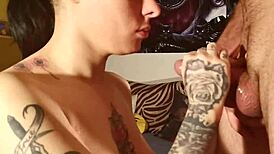 tattooed teen gets multiple titty cumshots in bukkake gangbang