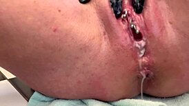 european housewife fingers her asshole with three gloves, gaping it wide, and pees at the end