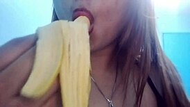 Asian Babe Performs Oral Deepthroat on Banana Toy in Seductive Fetish Play