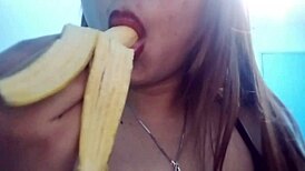 Asian Babe Performs Oral Deepthroat on Banana Toy in Seductive Fetish Play