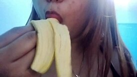 Asian Babe Performs Oral Deepthroat on Banana Toy in Seductive Fetish Play