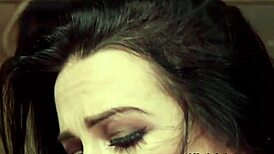 Who whips the slim brunette slave during rough deepthroat?