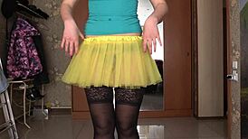 A girl (petite in panties and stockings) plugs her butt and rubs her small boobs in a solo video