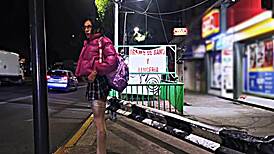 Public whore flashes miniskirt outdoors, teasing exhibitionist style in broad daylight. A true daring slut on display!