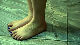 i'm showing my pretty feet, soles, and nails while walking naked and barefoot in the bedroom with bugs bunny blue nails