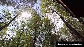 Damn, dirty blonde Sunny Lane fingers her wet pussy outside in hot scene!