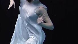 Andrejka does astonishing underwater moves in the pool