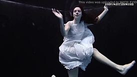 Andrejka does astonishing underwater moves in the pool