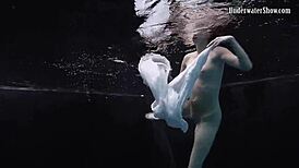 Andrejka does astonishing underwater moves in the pool