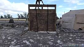 Army men masturbate in fatigues on the couch before hot gay sex.