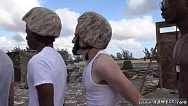 Army men masturbate in fatigues on the couch before hot gay sex.