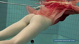 katya okuneva stuns in red dress by the pool