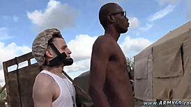 Army men masturbate in fatigues on the couch before hot gay sex.