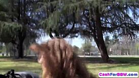 Chubby teen with round tits jerks off massive cock suggestively.