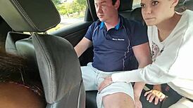 girl giving sloppy blowjob in moving car's backseat