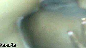 Seated, an African American woman rides my penis