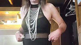 Brunette ladyboy models new panties in solo session.