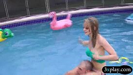 two bikini girls sucking and fucking hard by the pool!