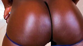 Ebony goddess strips and teases big ass in lingerie solo