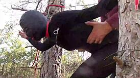 Yo, tied her up outdoors in pantyhose and boots for a rough bang! 😈