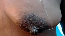 ebony amateur shows off saggy tits and big long nipples on webcam