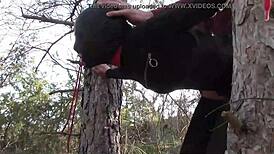 Yo, tied her up outdoors in pantyhose and boots for a rough bang! 😈