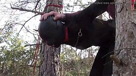 Yo, tied her up outdoors in pantyhose and boots for a rough bang! 😈