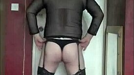 he stretches ballsacks in fishnets and stockings