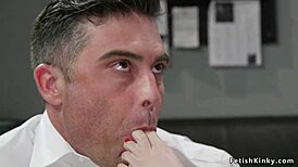 The federal agent, enslaved in bondage, worships the femdom's feet amidst strapon play and kinky toys.