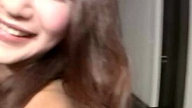 Shapely brunette ladyboy strips, rips clothes, and cums solo