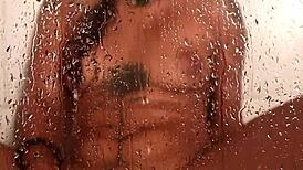 Taking a refreshing shower in the bathroom, feeling the warm water cascade over my body as I bathe peacefully