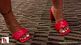 Ebony feet tease with dry soles in a footjob ASMR session.