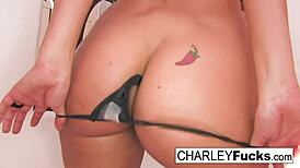 i love how charley chase looks in red and black fishnets while using her dildo