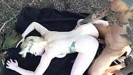 the nympho gets tattooed and fucked in missionary and doggystyle outdoors before cumshot