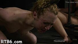 Sexy thrall naked in BDSM scene sucks cock to orgasm.