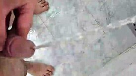 Twink pisses deliciously in the shower