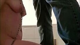 Slave Receives Cumshot and Blowjob in BDSM Session with Whore