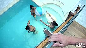 Three stunning bombshells share a cock by the pool
