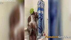 ebony goddess claps booty and plays with toys in shower