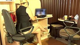 Secretary in miniskirt flashes at corporate party.