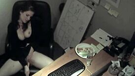 secretary at work rubbing her tits and fingering her pussy to orgasm