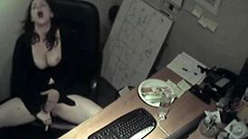 secretary at work rubbing her tits and fingering her pussy to orgasm