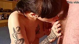 Tattooed teen takes multiple cumshots in wild HD bukkake gangbang