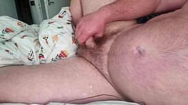 A Man Moans During Backhand Masturbation, Reaching Orgasm With Huge Cock