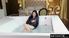 Petite teen gets naked masturbates to orgasm in jacuzzi dripping wet