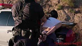 Young stunners cuffed and interrogated by police officer.